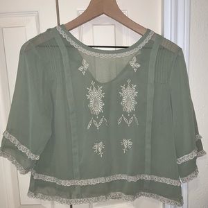 URBAN OUTFITTERS:  Beautiful color Bell sleeve top